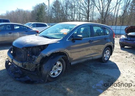 2013 Honda Cr-V Lx z USA, uszkodzony, nr VIN 2HKRM3H3XDH521392